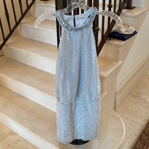 One box with 5 dresses sizes S/XS